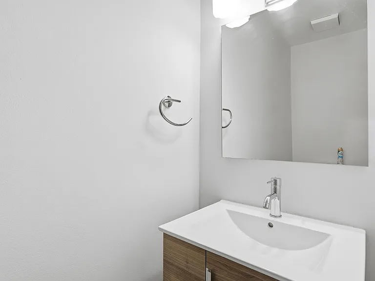 1/2 bathrooom near kitchen and living area