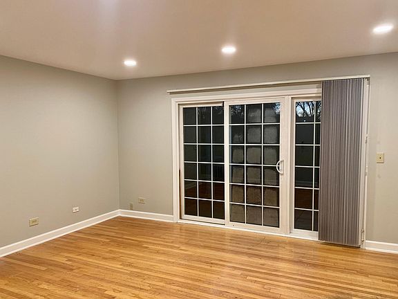 Hardwood oak floors. Agreeable grey new Benjamin Moor paint.