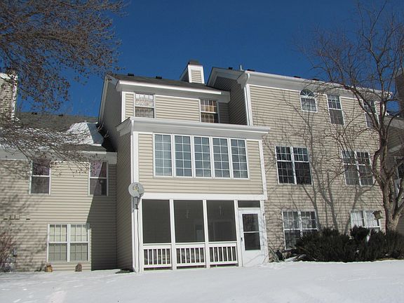 Rear: Sunroom & Screened-in Porch