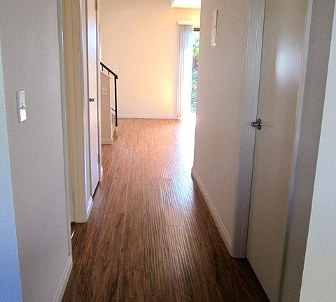 Hallway to Living & Dining Rooms with Wood Floors