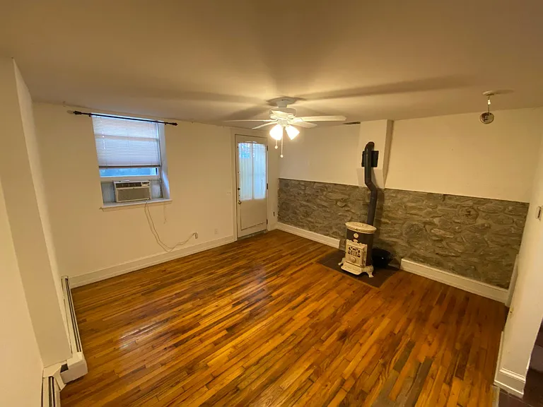 ANOTHER VIEW OF LIVING ROOM, LIGHT WITH FAN