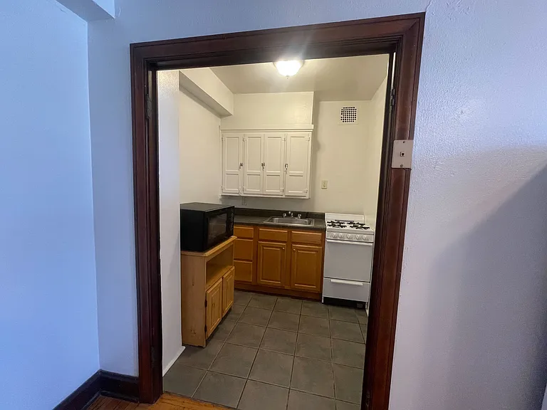 Kitchen has lots of storage space.