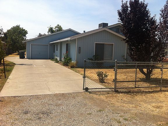 View showing garage on left.