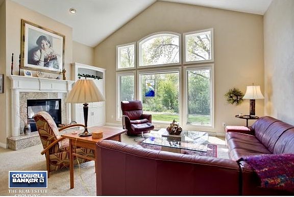 Living room overlooks treeline