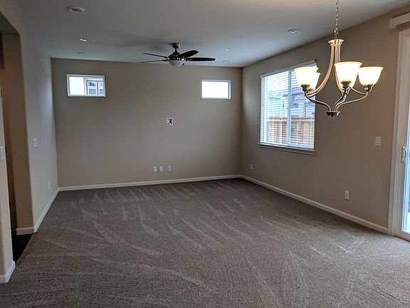 New vinyl flooring is being installed in this living area.