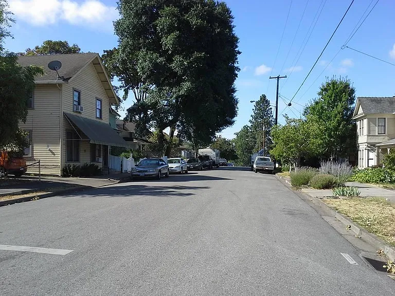 Street view - our property is located where those tallest trees provide much welcomed shade during the summer months