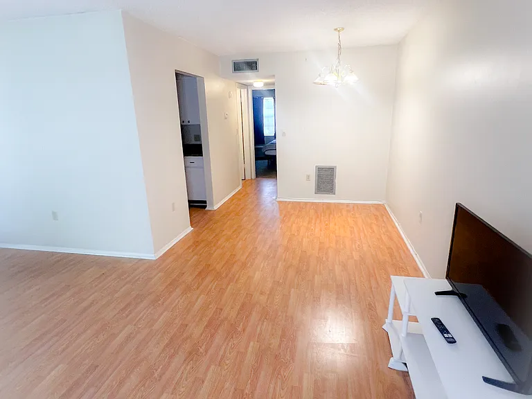 Unit is unfurnished and photos are staged. Furniture not included.