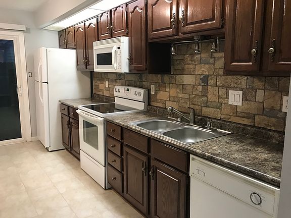 Kitchen to sliding glass door.