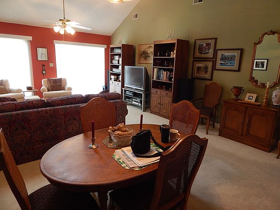 Table has leaf and 6 chairs