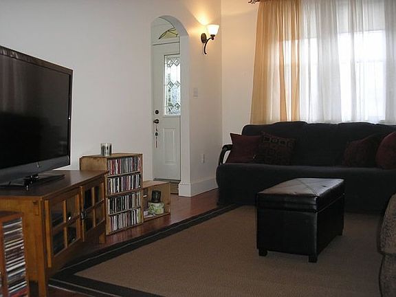 2 couches and a big flatscreen with room to spare!