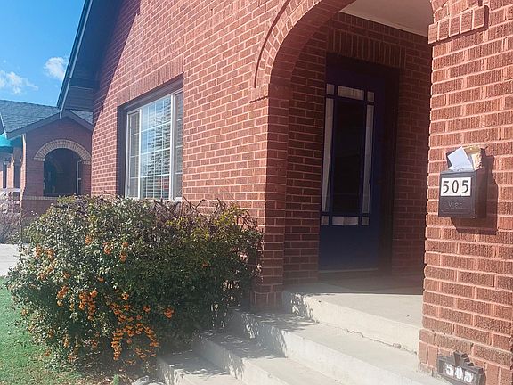 front porch to watch the world go by. locking mailbox