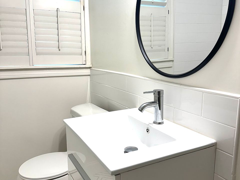 New designer bathroom with waterfall showerhead and modern finishes