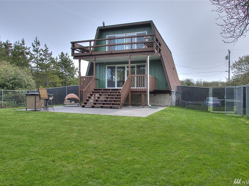 Huge Glass Sliding Doors Facing the Fenced Back Yard