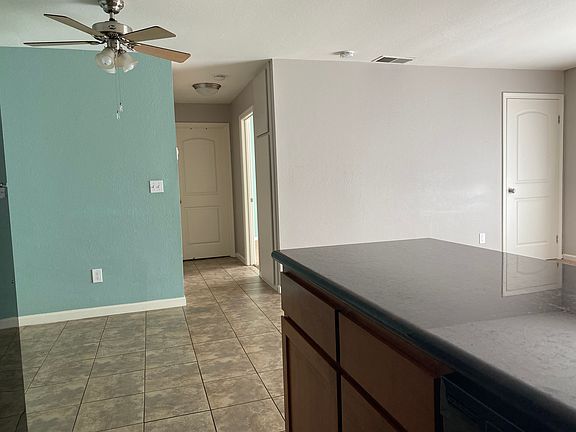 View of dining area and hall from the kitchen