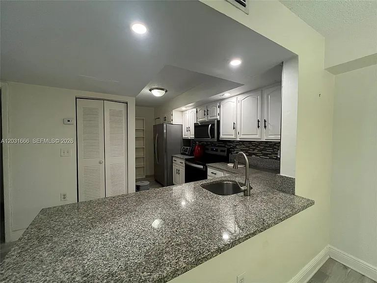 8580 SW 212th St #104 — Photo 6