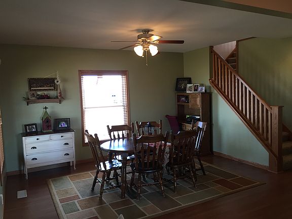 dining room with open stairs