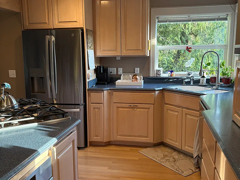 kitchen with dishwasher, french door refrigerator, gas stove, dacor oven, microwave and food prep sink