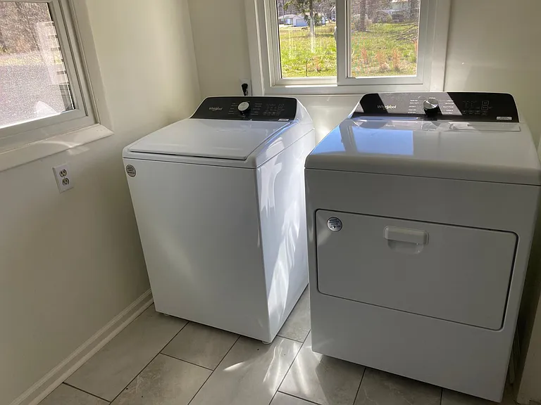 Just off the kitchen is the spacious laundry room