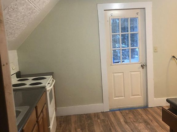 Seeing Kitchen facing door to deck