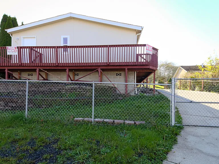 North side of home and driveway.