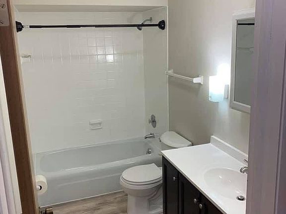 Updated bathroom - with new hardware and new tub surround