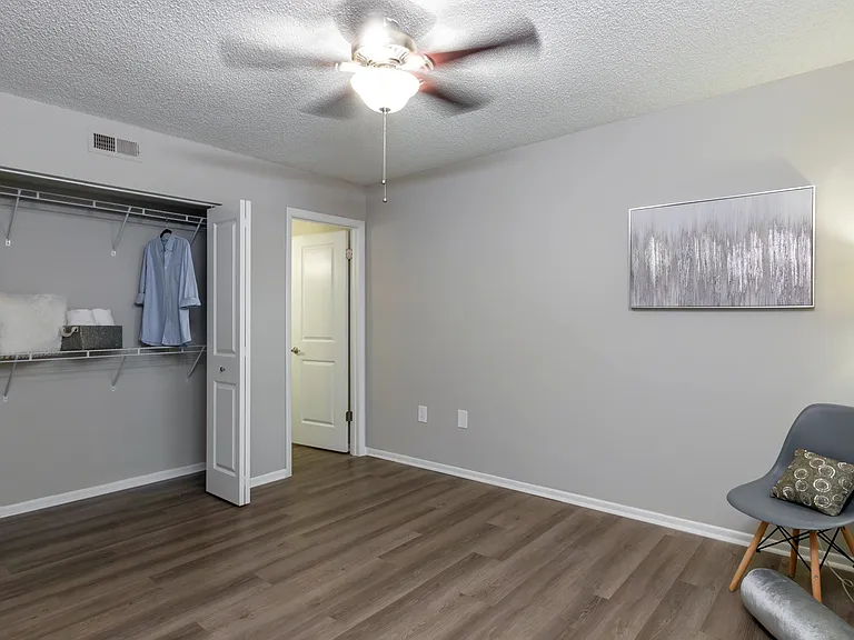 Spacious bedrooms with generous closet space that whisper 'organization' and dreams that say 'home.'