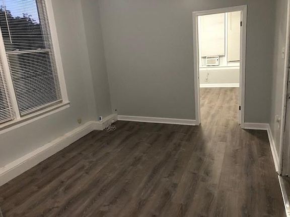 Living room. Through that open door is the master bedroom