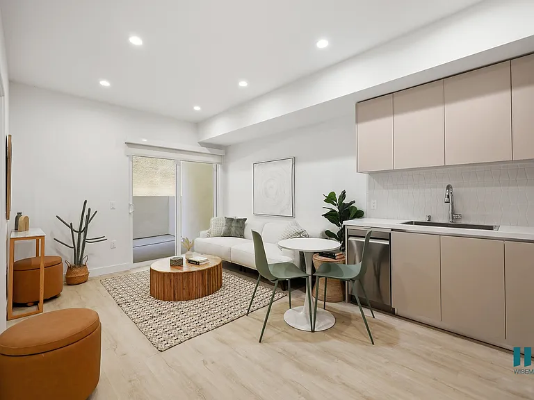 Open-Concept Floor Plan with a Patio, Recessed Lighting, and Vinyl Flooring
