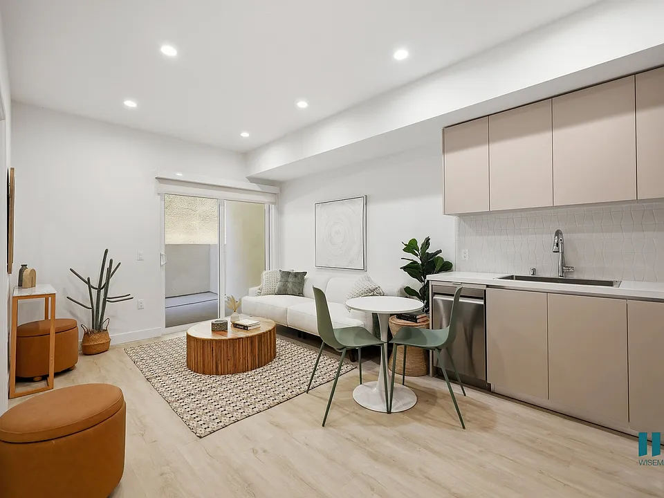 Open-Concept Floor Plan with a Patio, Recessed Lighting, and Vinyl Flooring