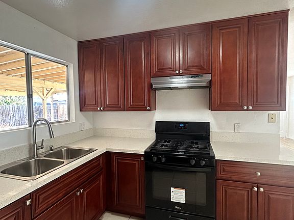 Kitchen -- showing window to patio and appliances