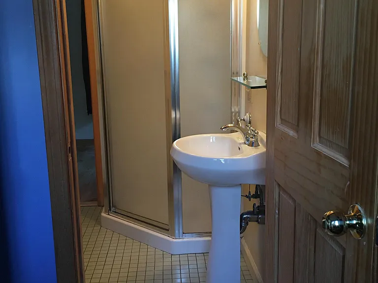 full bath with shower just off mudroom as you enter from drive (approx. 4' x 6')