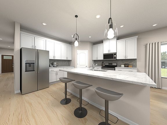 Prep dinner in the kitchen without missing the conversation in the great room.