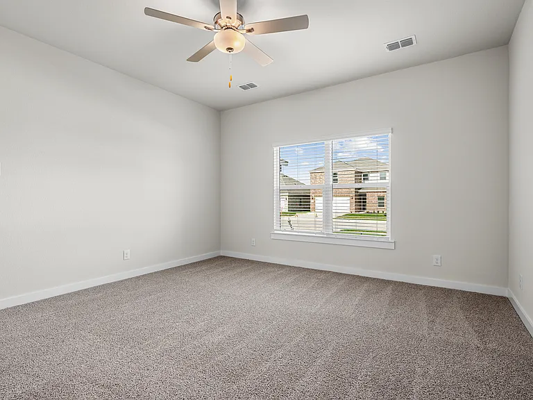The master suite has a large bedroom, ensuite bathroom and a walk-in closet.