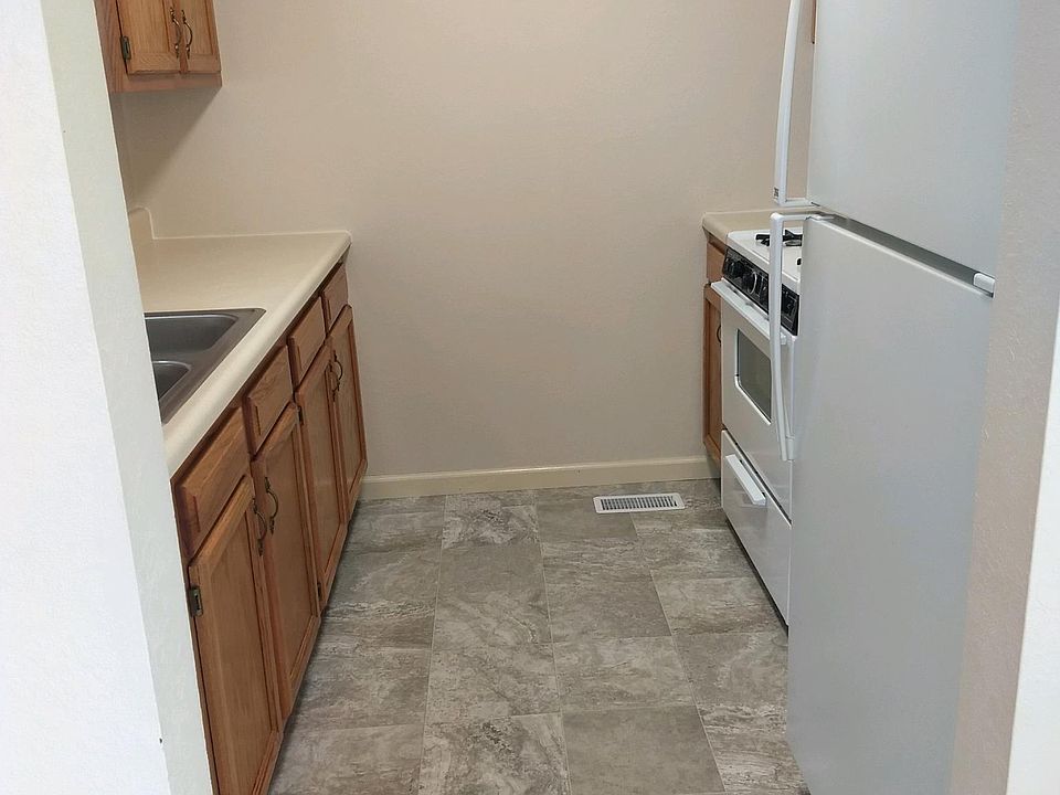 KITCHEN HAS STOVE & REFIGERATOR