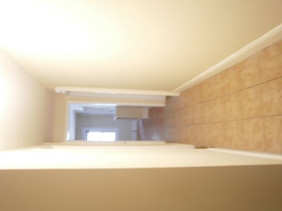 Apartment entrance tiled hallway.