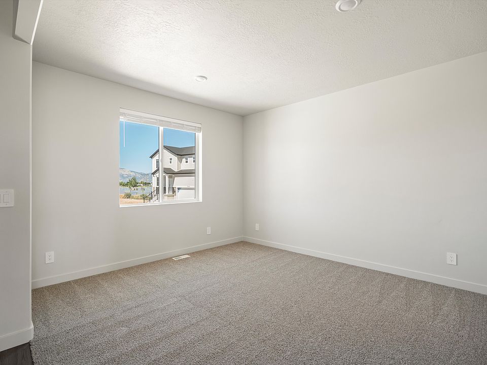 The residence 5 floorplan interior image taken at a Meritage Homes Community in West Haven, UT.