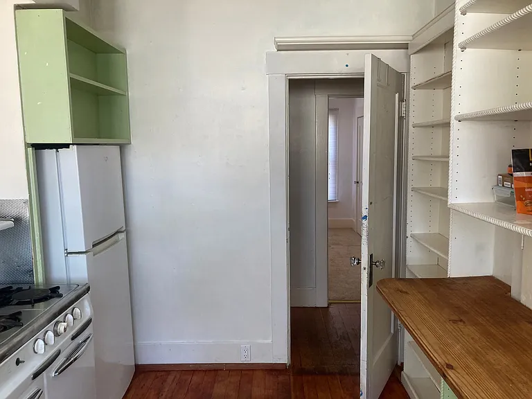 View of kitchen to hall