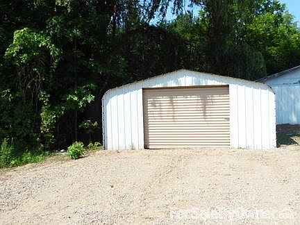 Steel Garage
						:
						Large enough for lawn mower, ATV and other outdoor equipment.