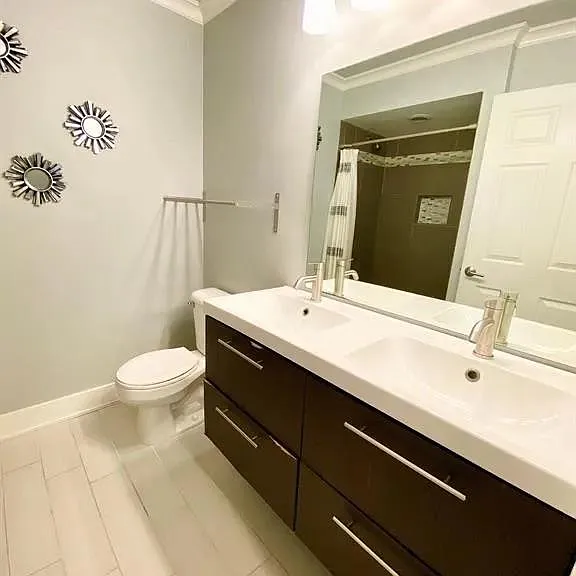 Primary Bathroom -- Dual Sink, Porcelain Countertop, Soft-Close Drawers