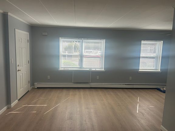 Living room and front door on left
