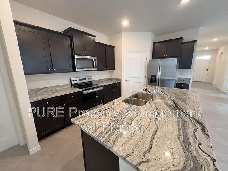 4122 NW 48th Terrace Rd — Photo 13