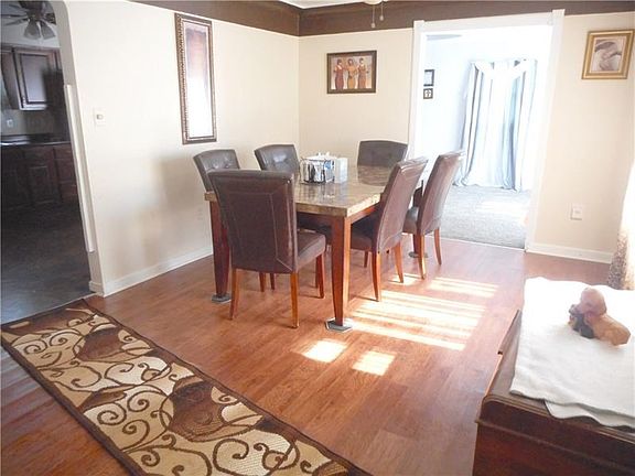 Dining Room: The gracious dining room is open to the living room for smart entertaining.