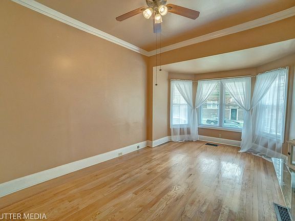 5th image of 7937 S Coles Ave
