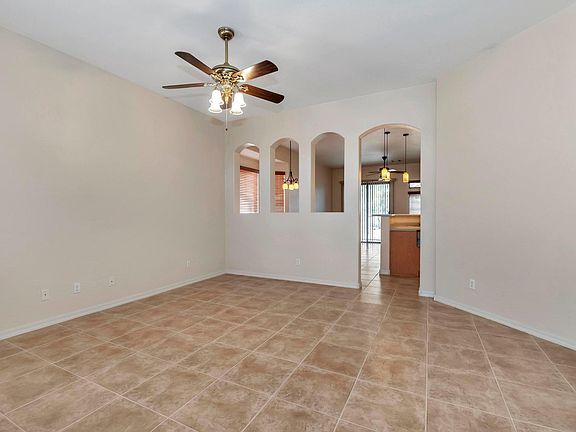 Living room looking to family room & kithen