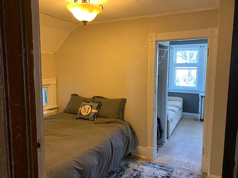 2nd bedroom on the 2nd floor - has 2 rooms bed and 2nd room with couch, TV, this view is room 1