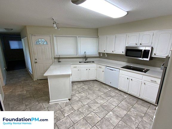 3rd image of 5877 Pebble Beach Ave