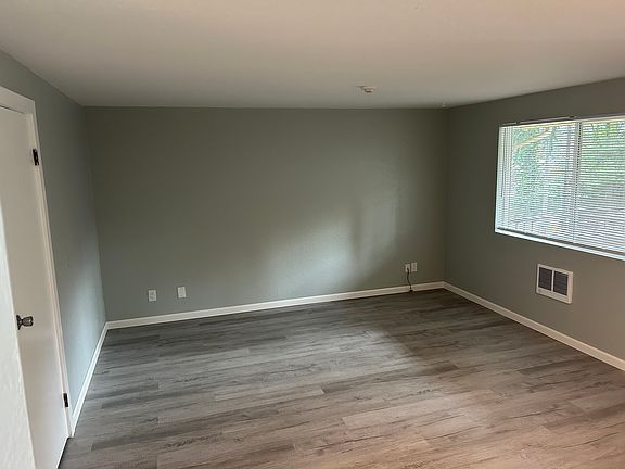 Livingroom with new built-in electric forced air heater.
