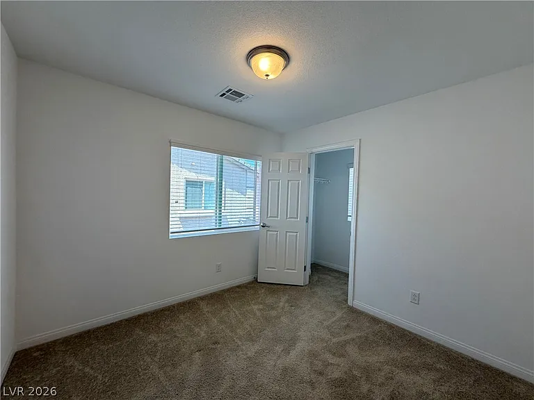 7869 Tyrell Peaks St — Photo 13