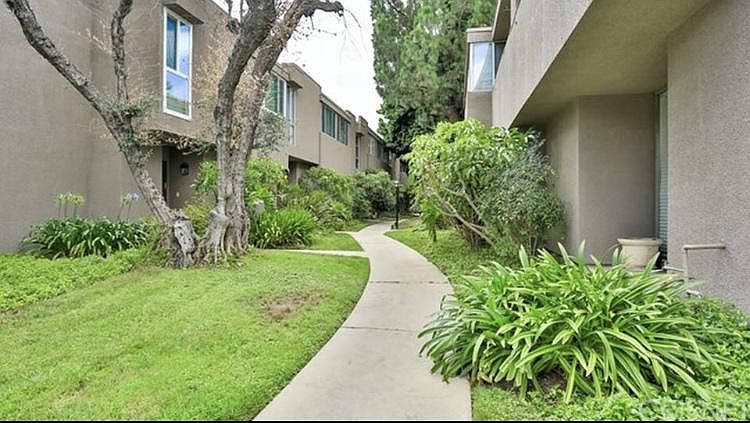 Footpath leading from street into complex, back to unit #10