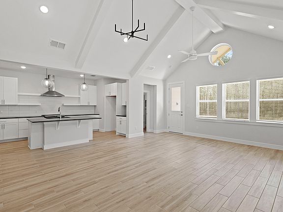 Dining area with vaulted ceiling
